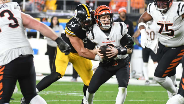Dec 23, 2023; Pittsburgh, Pennsylvania, USA; Pittsburgh Steelers linebacker Alex Highsmith (56) sacks Cincinnati Bengals quarterback Jake Browning (6) during the third quarter at Acrisure Stadium. The Steelers won 34-11. Mandatory Credit: Philip G. Pavely-USA TODAY Sports  